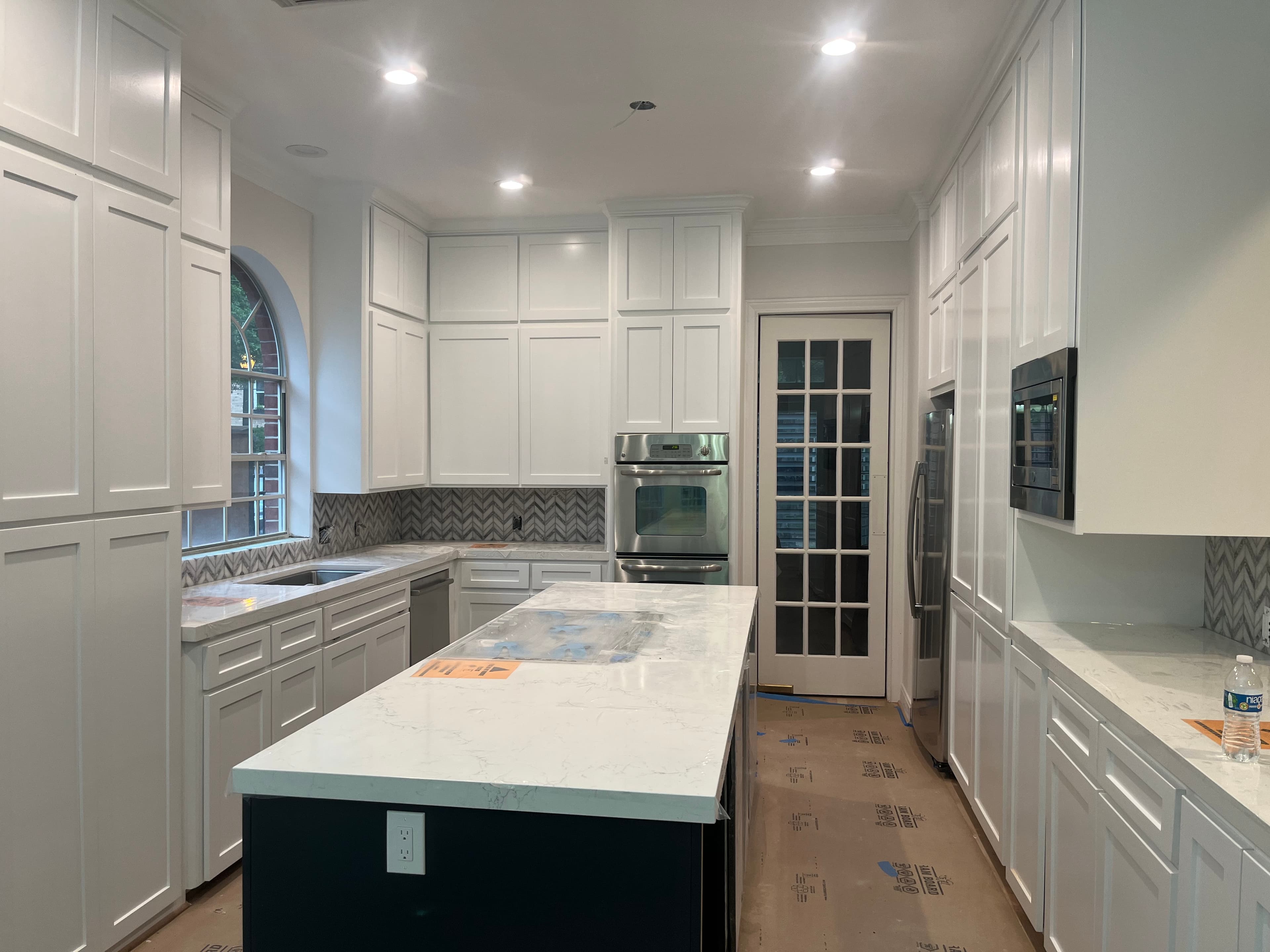 Warm wood cabinetry with lighting
